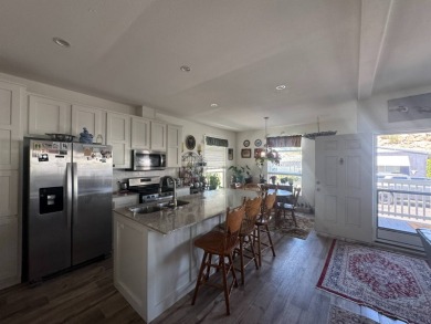 This 2021 model year "pre-owned" home that is on Hemet West Mobile Estates in California - for sale on GolfHomes.com, golf home, golf lot