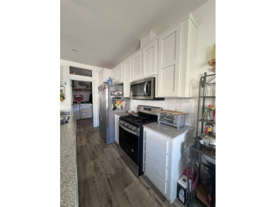 This 2021 model year "pre-owned" home that is on Hemet West Mobile Estates in California - for sale on GolfHomes.com, golf home, golf lot