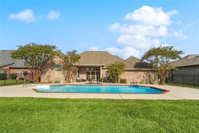 Beautiful 4-bedroom, 3-bath home located in the gated Masters on Oak Harbor Golf Club in Louisiana - for sale on GolfHomes.com, golf home, golf lot