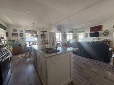 This 2021 model year "pre-owned" home that is on Hemet West Mobile Estates in California - for sale on GolfHomes.com, golf home, golf lot