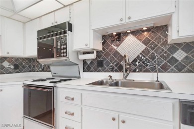 GORGEOUS GOLF COURSE AND LAKE VIEWS WITHOUT THE GOLF FEES! on Myerlee Country Club in Florida - for sale on GolfHomes.com, golf home, golf lot
