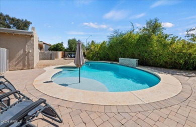 Charming and bright 5-bedroom, 3-bathroom home nestled in a on Gainey Ranch Golf Club in Arizona - for sale on GolfHomes.com, golf home, golf lot