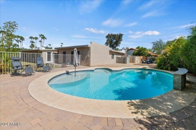 Charming and bright 5-bedroom, 3-bathroom home nestled in a on Gainey Ranch Golf Club in Arizona - for sale on GolfHomes.com, golf home, golf lot