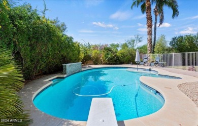 Charming and bright 5-bedroom, 3-bathroom home nestled in a on Gainey Ranch Golf Club in Arizona - for sale on GolfHomes.com, golf home, golf lot