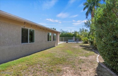 Charming and bright 5-bedroom, 3-bathroom home nestled in a on Gainey Ranch Golf Club in Arizona - for sale on GolfHomes.com, golf home, golf lot