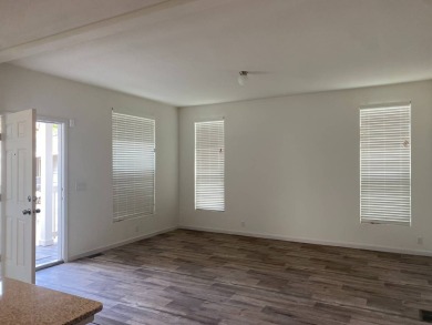 This 2021 model year "pre-owned" home that is on Hemet West Mobile Estates in California - for sale on GolfHomes.com, golf home, golf lot