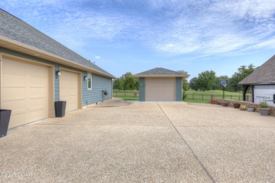 Luxury meets lifestyle in this custom-built masterpiece nestled on Briarbrook Golf Course in Missouri - for sale on GolfHomes.com, golf home, golf lot