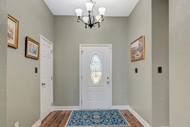 Discover this beautifully upgraded 3-bedroom, 2-bath home in the on Pecan Plantation Country Club in Texas - for sale on GolfHomes.com, golf home, golf lot