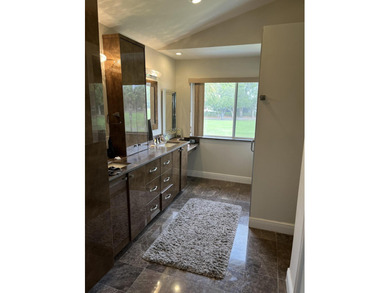 Welcome to this beautiful home in Boca Raton Country Club. This on The Boca Country Club in Florida - for sale on GolfHomes.com, golf home, golf lot