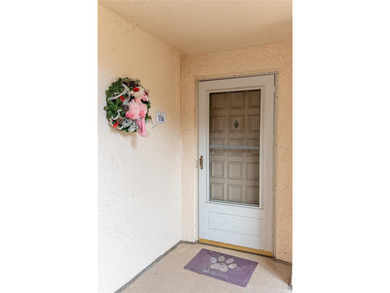 Step into paradise with this stunning 2-bedroom, 2-bathroom on Isla Del Sol Yacht and Country Club in Florida - for sale on GolfHomes.com, golf home, golf lot