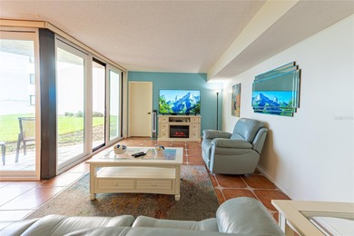 Step into paradise with this stunning 2-bedroom, 2-bathroom on Isla Del Sol Yacht and Country Club in Florida - for sale on GolfHomes.com, golf home, golf lot