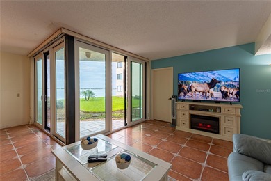 Step into paradise with this stunning 2-bedroom, 2-bathroom on Isla Del Sol Yacht and Country Club in Florida - for sale on GolfHomes.com, golf home, golf lot