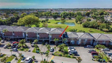 This three-story townhouse at Country Club of Miami offers ample on Country Club of Miami in Florida - for sale on GolfHomes.com, golf home, golf lot