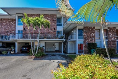 This three-story townhouse at Country Club of Miami offers ample on Country Club of Miami in Florida - for sale on GolfHomes.com, golf home, golf lot