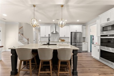 Move-in ready and better than new, this six-bedroom on Traditions of Braselton Golf Club in Georgia - for sale on GolfHomes.com, golf home, golf lot