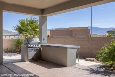 This exceptional one-level Cambria home is a true masterpiece on Wolf Creek At Paradise Canyon in Nevada - for sale on GolfHomes.com, golf home, golf lot