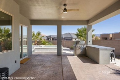 This exceptional one-level Cambria home is a true masterpiece on Wolf Creek At Paradise Canyon in Nevada - for sale on GolfHomes.com, golf home, golf lot