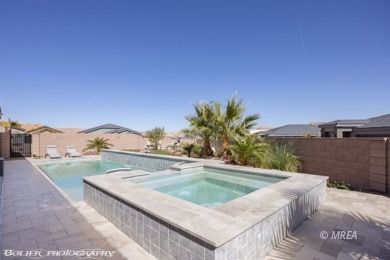 This exceptional one-level Cambria home is a true masterpiece on Wolf Creek At Paradise Canyon in Nevada - for sale on GolfHomes.com, golf home, golf lot