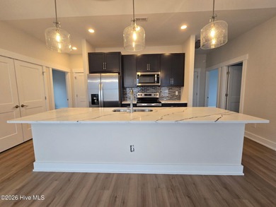 Have you been searching for a coastal cottage with clean lines on The Carolina Club in North Carolina - for sale on GolfHomes.com, golf home, golf lot