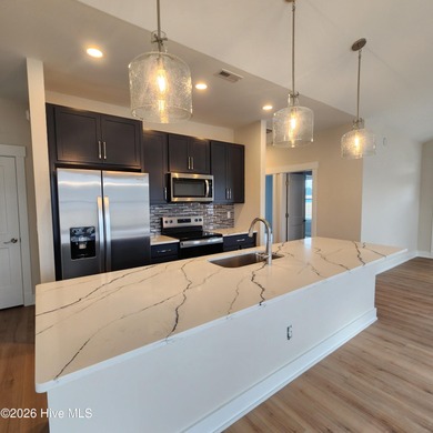 Have you been searching for a coastal cottage with clean lines on The Carolina Club in North Carolina - for sale on GolfHomes.com, golf home, golf lot