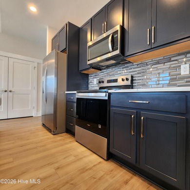 Have you been searching for a coastal cottage with clean lines on The Carolina Club in North Carolina - for sale on GolfHomes.com, golf home, golf lot