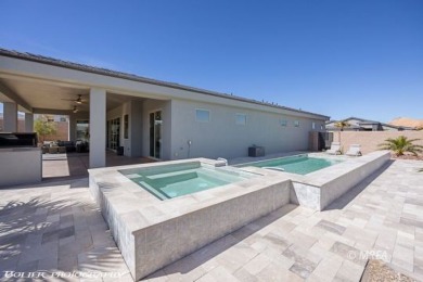 This exceptional one-level Cambria home is a true masterpiece on Wolf Creek At Paradise Canyon in Nevada - for sale on GolfHomes.com, golf home, golf lot