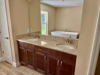 BEAUTIFUL 3 BED 2 BATH HOME W ADDITIONAL OFFICE/FLEX SPACE AND on Southern Woods Golf Club in Florida - for sale on GolfHomes.com, golf home, golf lot