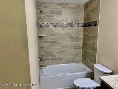 BEAUTIFUL 3 BED 2 BATH HOME W ADDITIONAL OFFICE/FLEX SPACE AND on Southern Woods Golf Club in Florida - for sale on GolfHomes.com, golf home, golf lot