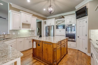 Welcome to this beautiful traditional home ideally situated on Sugar Tree Golf and Country Club in Texas - for sale on GolfHomes.com, golf home, golf lot