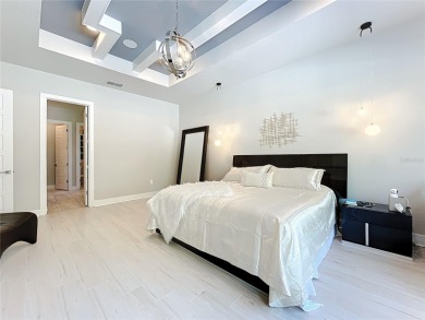 Welcome to this gated custom SMART home in Red Tail Golf & on Red Tail Golf Club in Florida - for sale on GolfHomes.com, golf home, golf lot