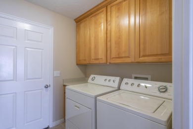 Welcome to this beautifully maintained 3-bedroom, 2-bath home in on Sunbrook Golf Course in Utah - for sale on GolfHomes.com, golf home, golf lot