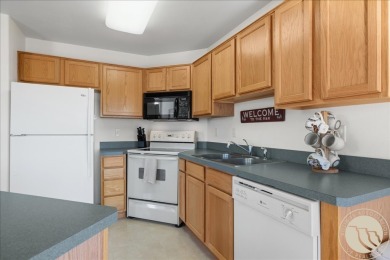 Kick back on the front deck or private upstairs balcony of this on Red Lodge Golf Club in Montana - for sale on GolfHomes.com, golf home, golf lot