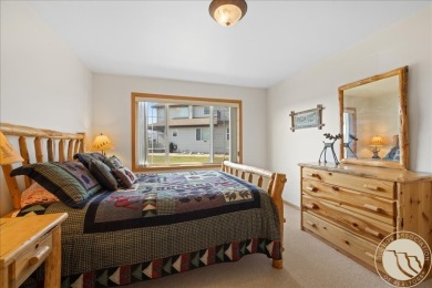 Kick back on the front deck or private upstairs balcony of this on Red Lodge Golf Club in Montana - for sale on GolfHomes.com, golf home, golf lot