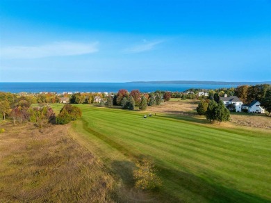 Welcome to this exquisite 4 bedroom, 4 bath home nestled in the on Crooked Tree Golf Club in Michigan - for sale on GolfHomes.com, golf home, golf lot