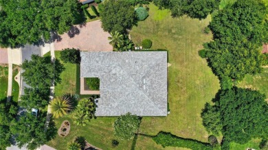 Welcome to this stunning 4-bedroom, 3-bathroom home with a on Red Tail Golf Club in Florida - for sale on GolfHomes.com, golf home, golf lot