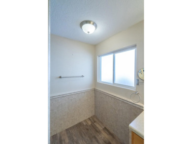 Welcome to this beautifully maintained 3-bedroom, 2-bath home in on Sunbrook Golf Course in Utah - for sale on GolfHomes.com, golf home, golf lot