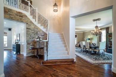 Prepare to be captivated by breathtaking golf and water vistas on Hackberry Creek Country Club in Texas - for sale on GolfHomes.com, golf home, golf lot