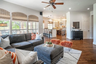 Prepare to be captivated by breathtaking golf and water vistas on Hackberry Creek Country Club in Texas - for sale on GolfHomes.com, golf home, golf lot