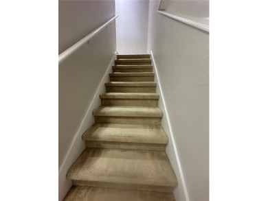 Step into this beautifully maintained 2-bedroom, 2.5-bath on Sandpiper Golf Club in Florida - for sale on GolfHomes.com, golf home, golf lot