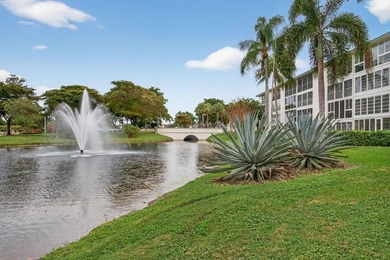 Beautiful Water View 1st Floor, Parking Spot is in front of the on Wynmoor Golf Course in Florida - for sale on GolfHomes.com, golf home, golf lot