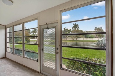 Beautiful Water View 1st Floor, Parking Spot is in front of the on Wynmoor Golf Course in Florida - for sale on GolfHomes.com, golf home, golf lot