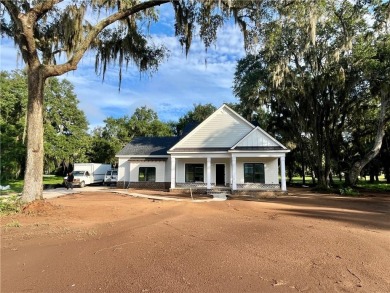 Come See this Beautiful Brand New Construction by Merit Homes in on Sapelo Hammock Golf Club in Georgia - for sale on GolfHomes.com, golf home, golf lot