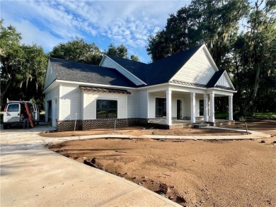 Come See this Beautiful Brand New Construction by Merit Homes in on Sapelo Hammock Golf Club in Georgia - for sale on GolfHomes.com, golf home, golf lot