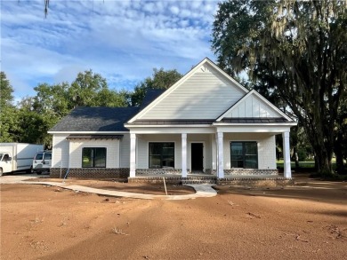Come See this Beautiful Brand New Construction by Merit Homes in on Sapelo Hammock Golf Club in Georgia - for sale on GolfHomes.com, golf home, golf lot