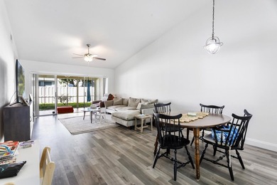 Nestled on a quiet street, this turnkey CBS townhouse has been on The Golf Club of Jupiter in Florida - for sale on GolfHomes.com, golf home, golf lot