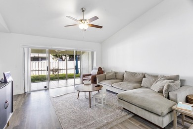 Nestled on a quiet street, this turnkey CBS townhouse has been on The Golf Club of Jupiter in Florida - for sale on GolfHomes.com, golf home, golf lot