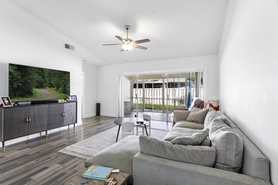 Nestled on a quiet street, this turnkey CBS townhouse has been on The Golf Club of Jupiter in Florida - for sale on GolfHomes.com, golf home, golf lot