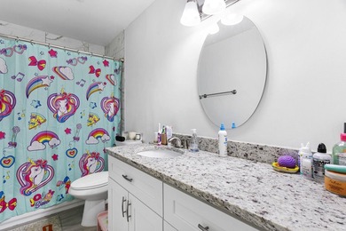 Nestled on a quiet street, this turnkey CBS townhouse has been on The Golf Club of Jupiter in Florida - for sale on GolfHomes.com, golf home, golf lot