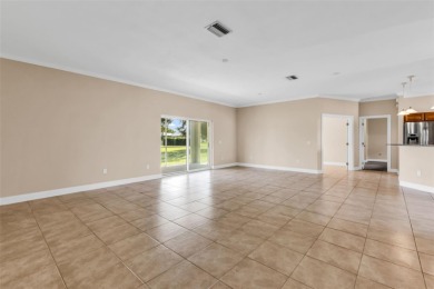 Under contract-accepting backup offers. Welcoming 3 bedroom, 2 on Deep Creek Golf Club in Florida - for sale on GolfHomes.com, golf home, golf lot