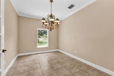 Under contract-accepting backup offers. Welcoming 3 bedroom, 2 on Deep Creek Golf Club in Florida - for sale on GolfHomes.com, golf home, golf lot